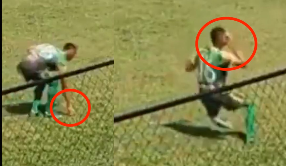 Video Football player picks up object and hits himself in face with it to try and trick referee