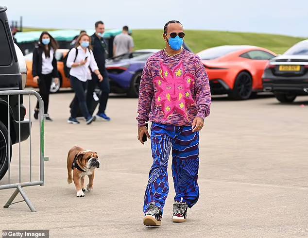 Photo) F1 superstar Lewis Hamilton dons outrageous psychedelic outfit