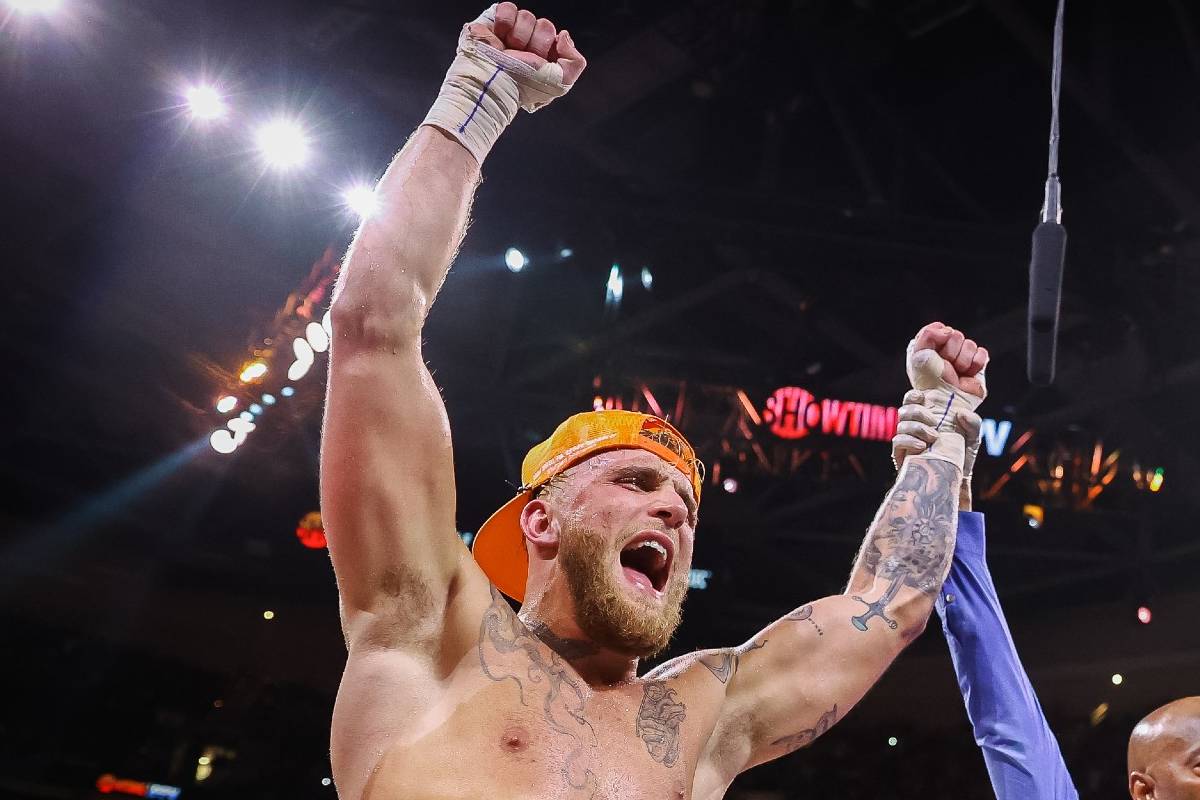 Jake Paul celebrates after being given the win over Tyron Woodley