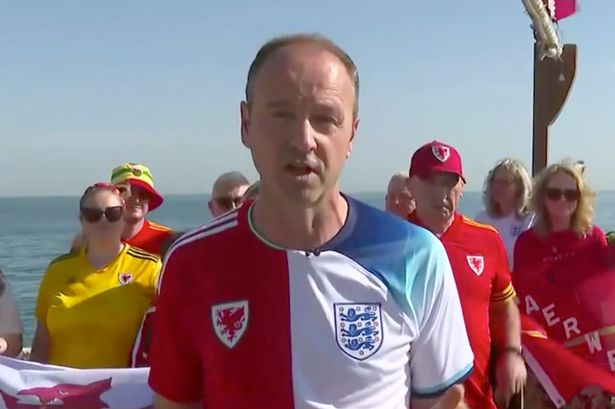 Jonathan Swain wears half-and-half England and Wales shirt